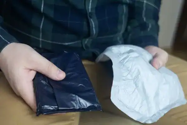 image of man holding stool incontinence Kingston upon Hull products